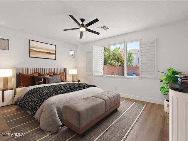 271 W Roadrunner Dr, Chandler, AZ 85286 - bedroom featuring baseboards, a ceiling fan, wood finished floors, and visible vents