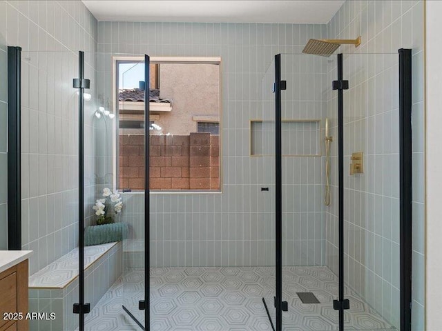 271 W Roadrunner Dr, Chandler, AZ 85286 - bathroom with vanity, tile patterned flooring, tile walls, and a shower stall