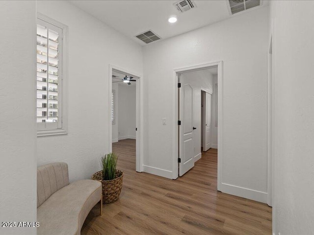 271 W Roadrunner Dr, Chandler, AZ 85286 - sitting room with baseboards, visible vents, and wood finished floors