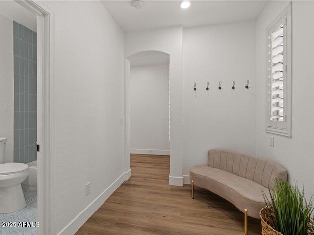 271 W Roadrunner Dr, Chandler, AZ 85286 - interior space with arched walkways, baseboards, recessed lighting, and wood finished floors