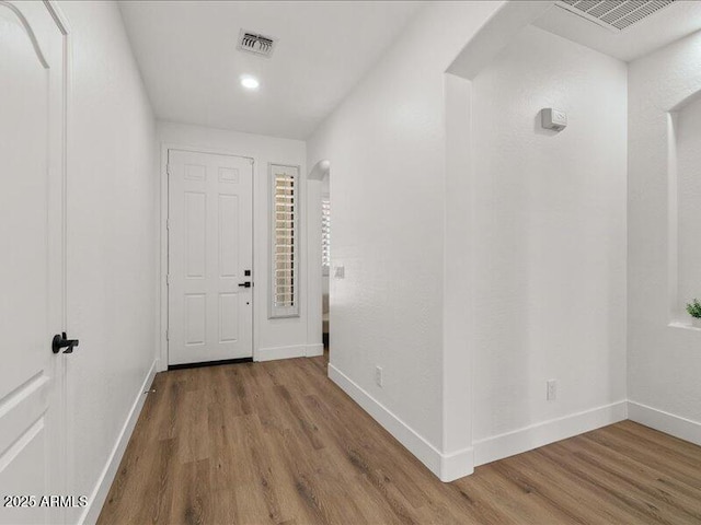 271 W Roadrunner Dr, Chandler, AZ 85286 - corridor with visible vents, baseboards, and wood finished floors