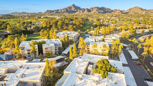 birds eye view of property with a mountain view