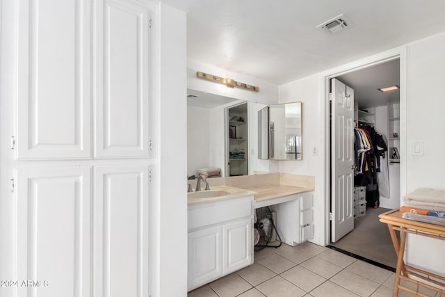 bathroom featuring vanity and tile patterned floors