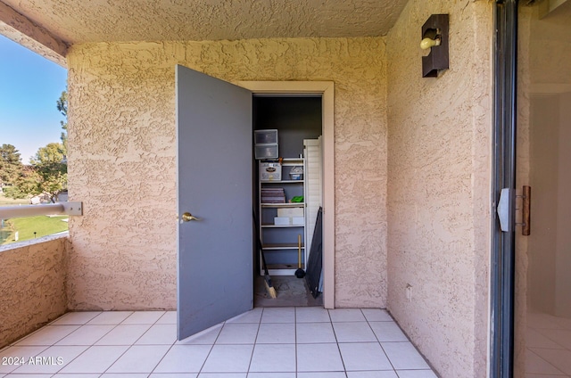 doorway to property with a balcony