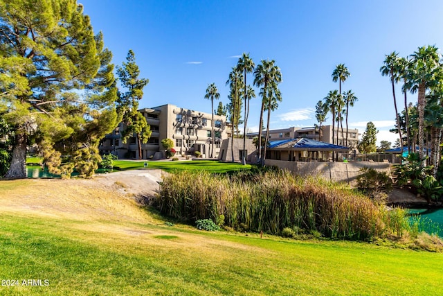 surrounding community featuring a lawn