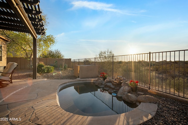 view of pool featuring a patio, a fenced backyard, a fenced in pool, and a pergola