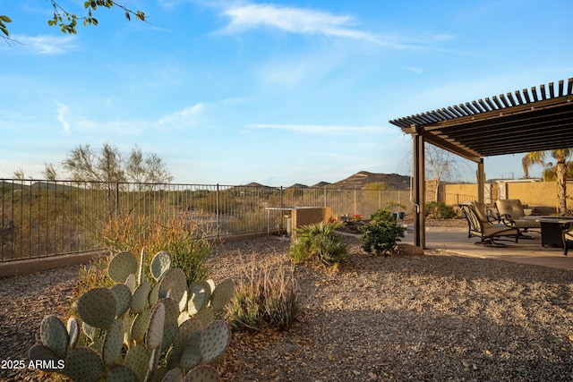 view of yard with an outdoor fire pit, a fenced backyard, and a patio