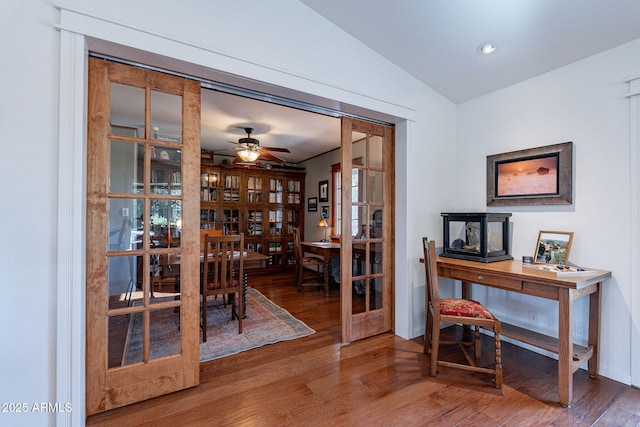dining area featuring a ceiling fan, baseboards, recessed lighting, wood finished floors, and vaulted ceiling