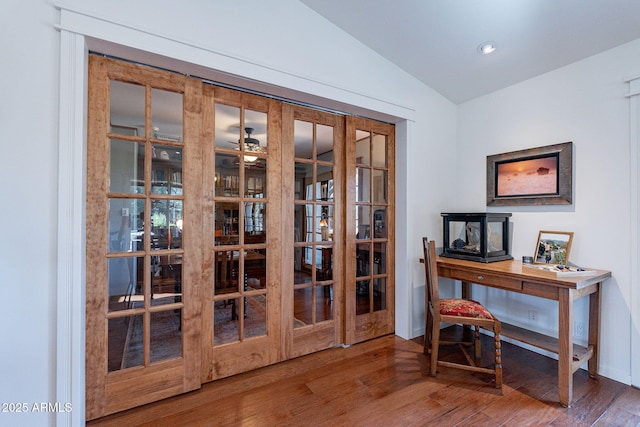 doorway to outside with ceiling fan, french doors, baseboards, wood finished floors, and vaulted ceiling