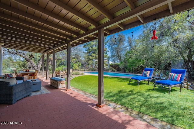 view of patio / terrace with an outdoor living space and an outdoor pool