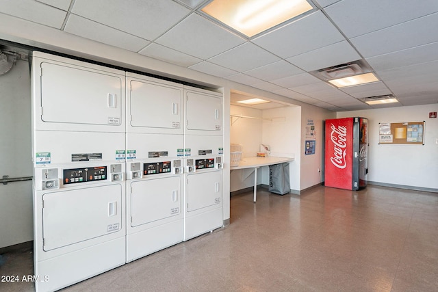 laundry area featuring stacked washer and dryer