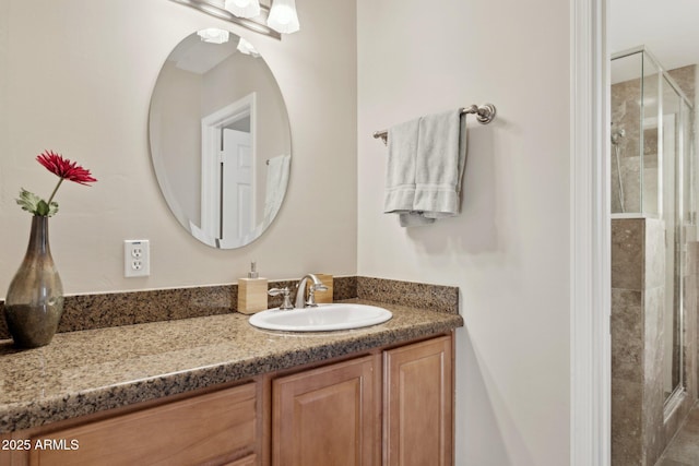 bathroom featuring vanity and walk in shower