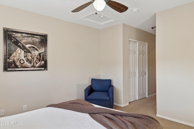 bedroom with light colored carpet, a closet, and ceiling fan