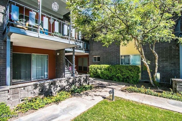 1630 E Georgia Ave Unit 208, Phoenix, AZ 85016 - view of exterior entry with a balcony