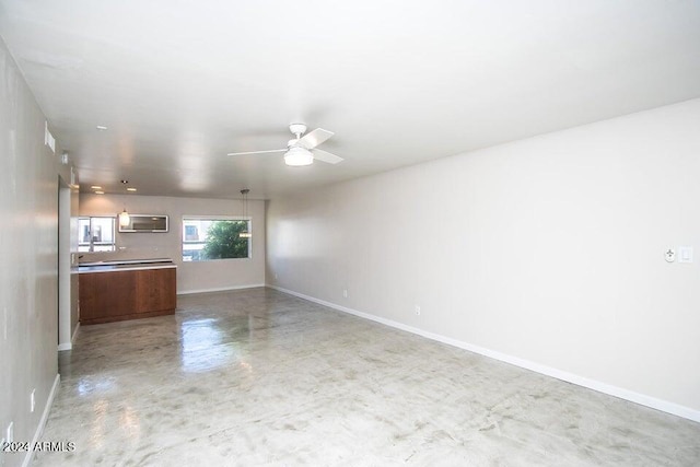 1630 E Georgia Ave Unit 208, Phoenix, AZ 85016 - unfurnished living room featuring concrete floors, a ceiling fan, and an AC wall unit