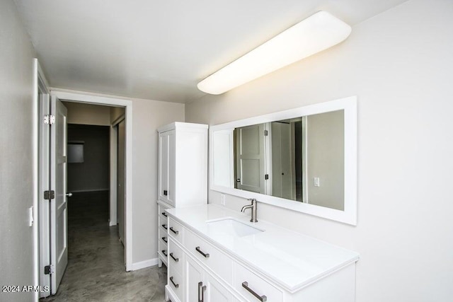 1630 E Georgia Ave Unit 208, Phoenix, AZ 85016 - bathroom with vanity and baseboards