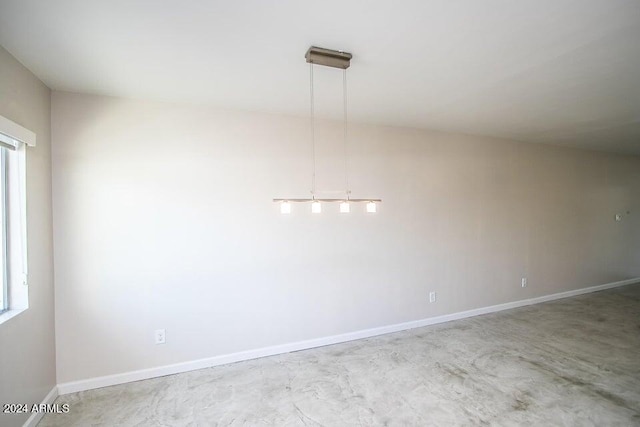 1630 E Georgia Ave Unit 208, Phoenix, AZ 85016 - empty room with baseboards and concrete flooring