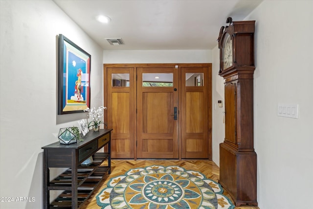 entryway featuring light parquet floors