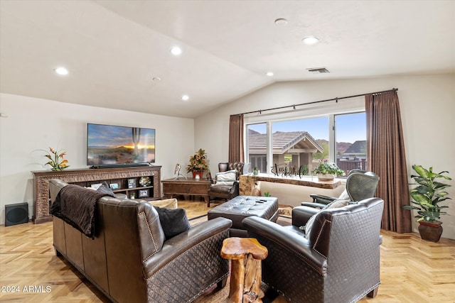 living room featuring light parquet floors and lofted ceiling