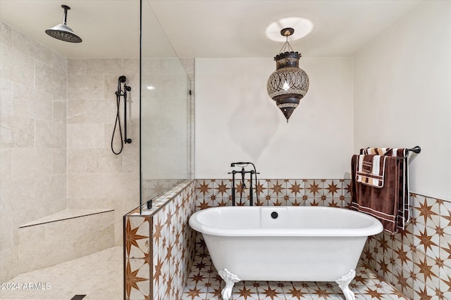 bathroom with plus walk in shower and tile walls