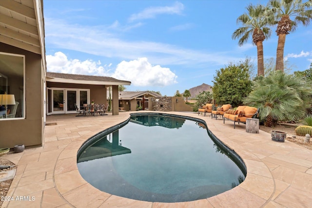 view of pool featuring a patio area