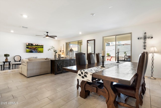 17140 W Running Deer Trl, Surprise, AZ 85387 - dining room with healthy amount of natural light, ceiling fan, recessed lighting, and light tile patterned floors