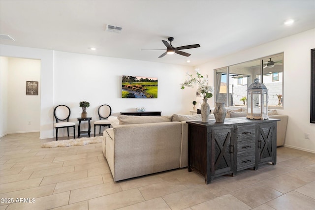 17140 W Running Deer Trl, Surprise, AZ 85387 - living room with ceiling fan, baseboards, light tile patterned floors, and recessed lighting