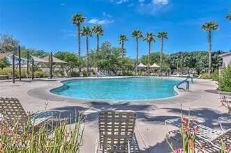 17140 W Running Deer Trl, Surprise, AZ 85387 - community pool featuring a patio area