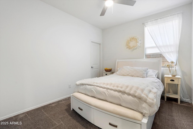 17140 W Running Deer Trl, Surprise, AZ 85387 - bedroom with dark colored carpet and a ceiling fan