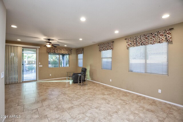 unfurnished room featuring ceiling fan