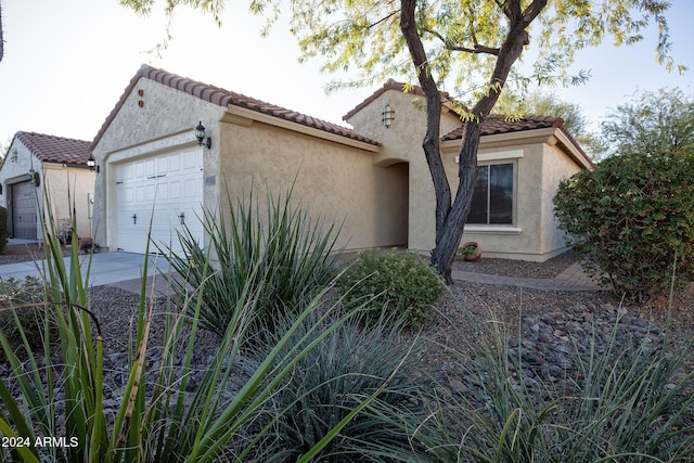 view of front of home featuring a garage