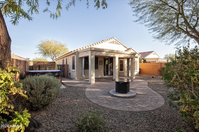 back of house featuring a patio area