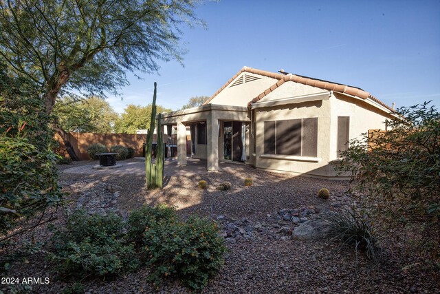 back of house featuring a patio