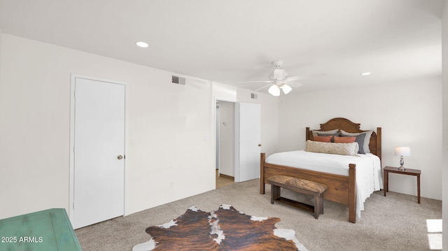 455 N Tegner St Unit 59, Wickenburg, AZ 85390 - bedroom with light carpet, a ceiling fan, and recessed lighting