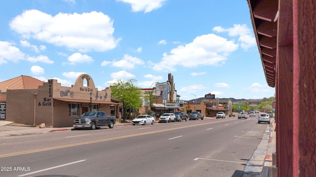 455 N Tegner St Unit 59, Wickenburg, AZ 85390 - view of asphalt street featuring sidewalks, curbs, and street lighting