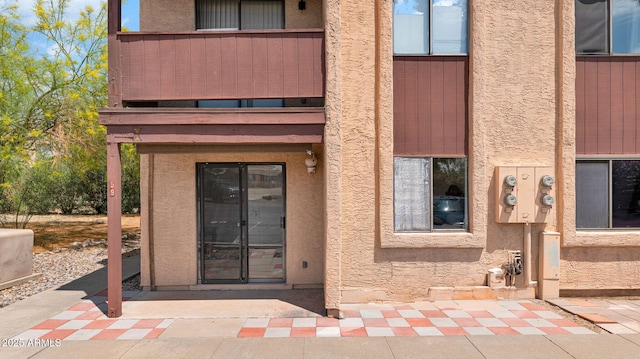 455 N Tegner St Unit 59, Wickenburg, AZ 85390 - view of exterior entry with stucco siding and french doors