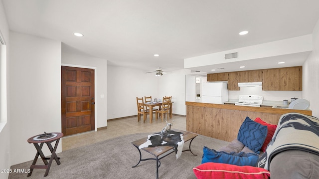 455 N Tegner St Unit 59, Wickenburg, AZ 85390 - living room featuring recessed lighting and light carpet