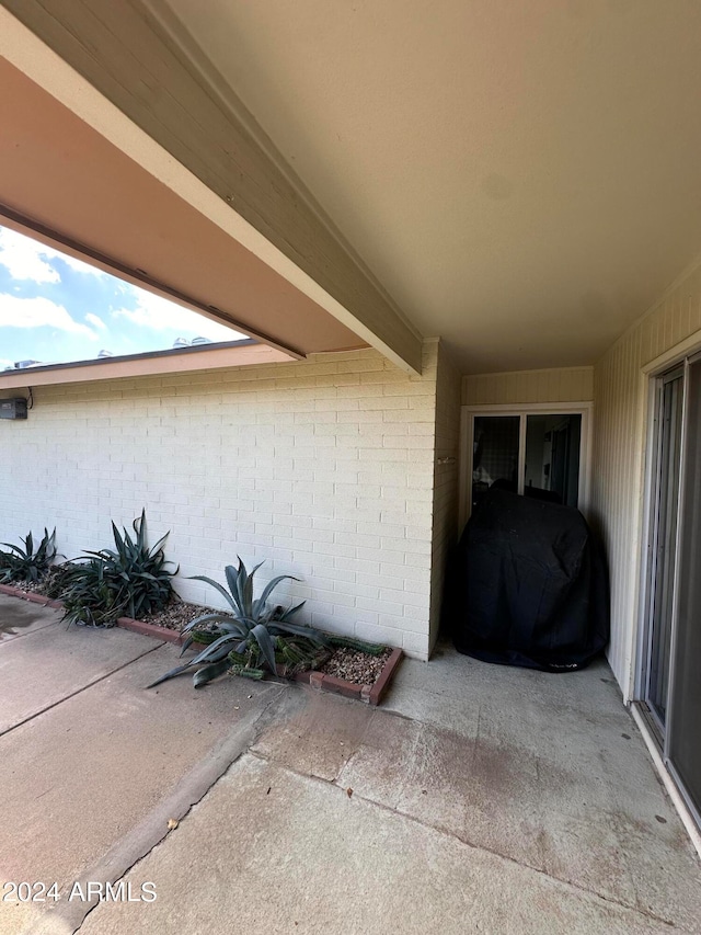 view of patio / terrace featuring a grill