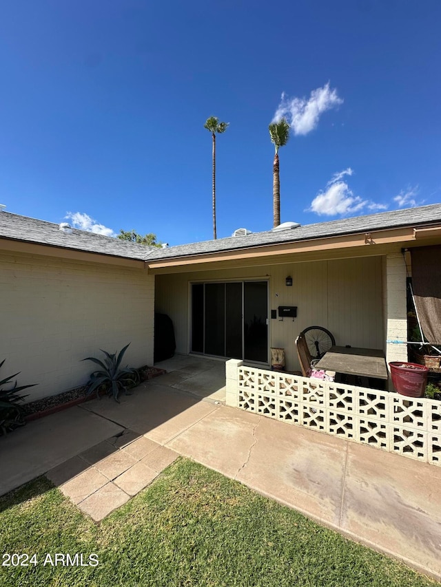 back of house featuring a patio area