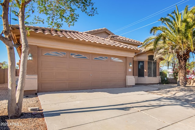 mediterranean / spanish-style house featuring a garage