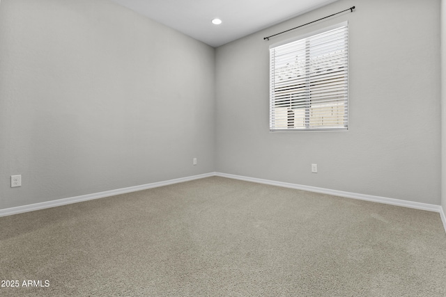 spare room with carpet flooring