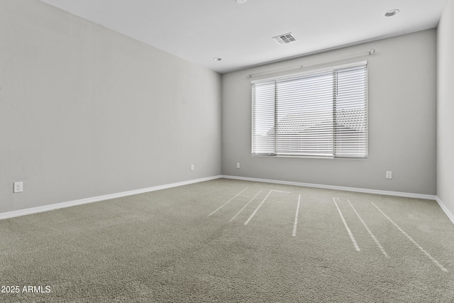 unfurnished room with carpet floors