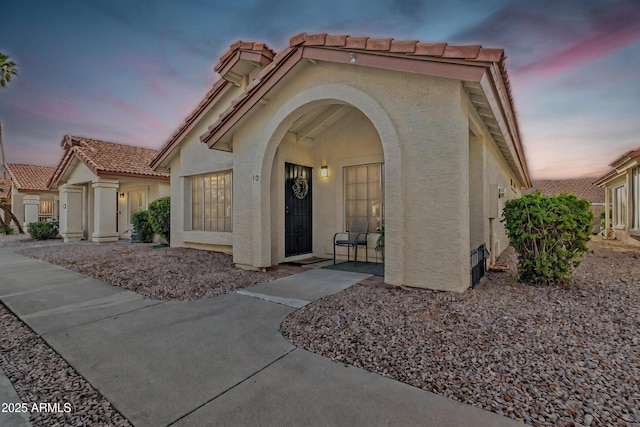 1120 N Val Vista Dr Unit 10, Gilbert, AZ 85234 - entrance to property with a tiled roof and stucco siding