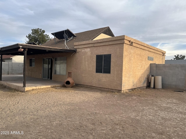 back of house featuring a patio