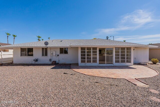 rear view of property with a patio