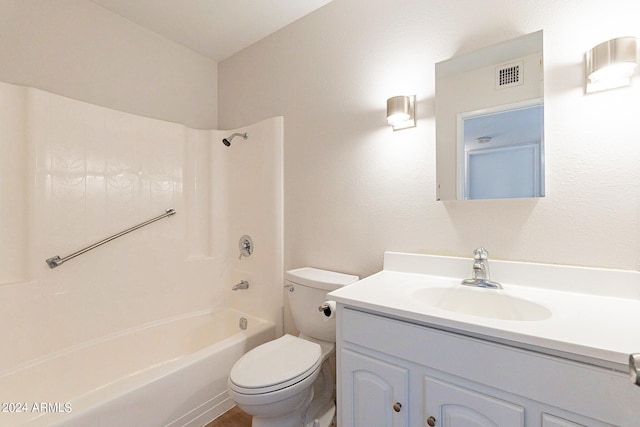 full bathroom with washtub / shower combination, toilet, and vanity