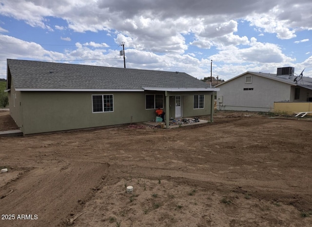 4790 E Goss Dr, Rimrock, AZ 86335 - back of house featuring roof with shingles and stucco siding