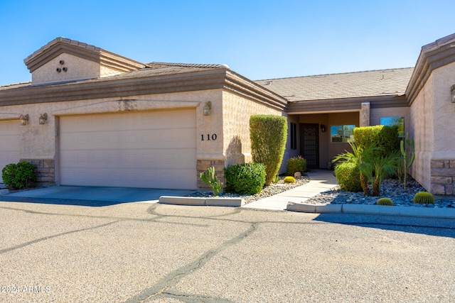 view of front of property featuring a garage