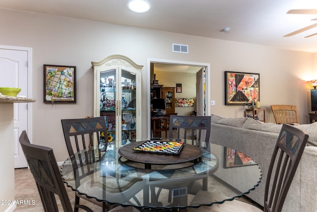 dining area with ceiling fan