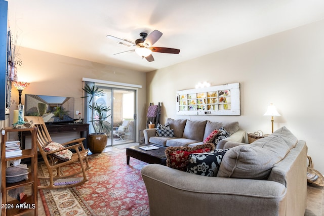 living room featuring ceiling fan